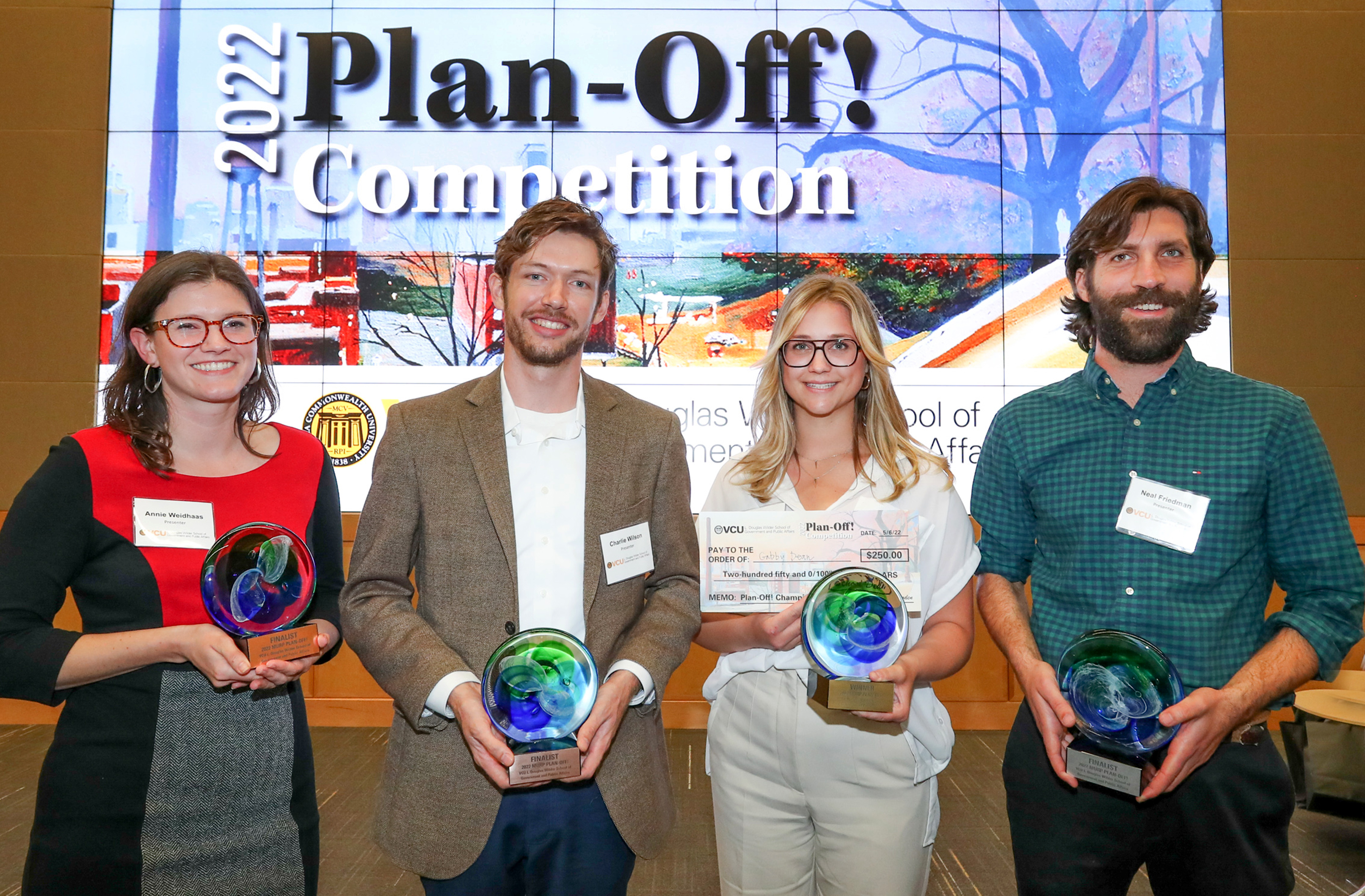 A group of students showcasing their awards