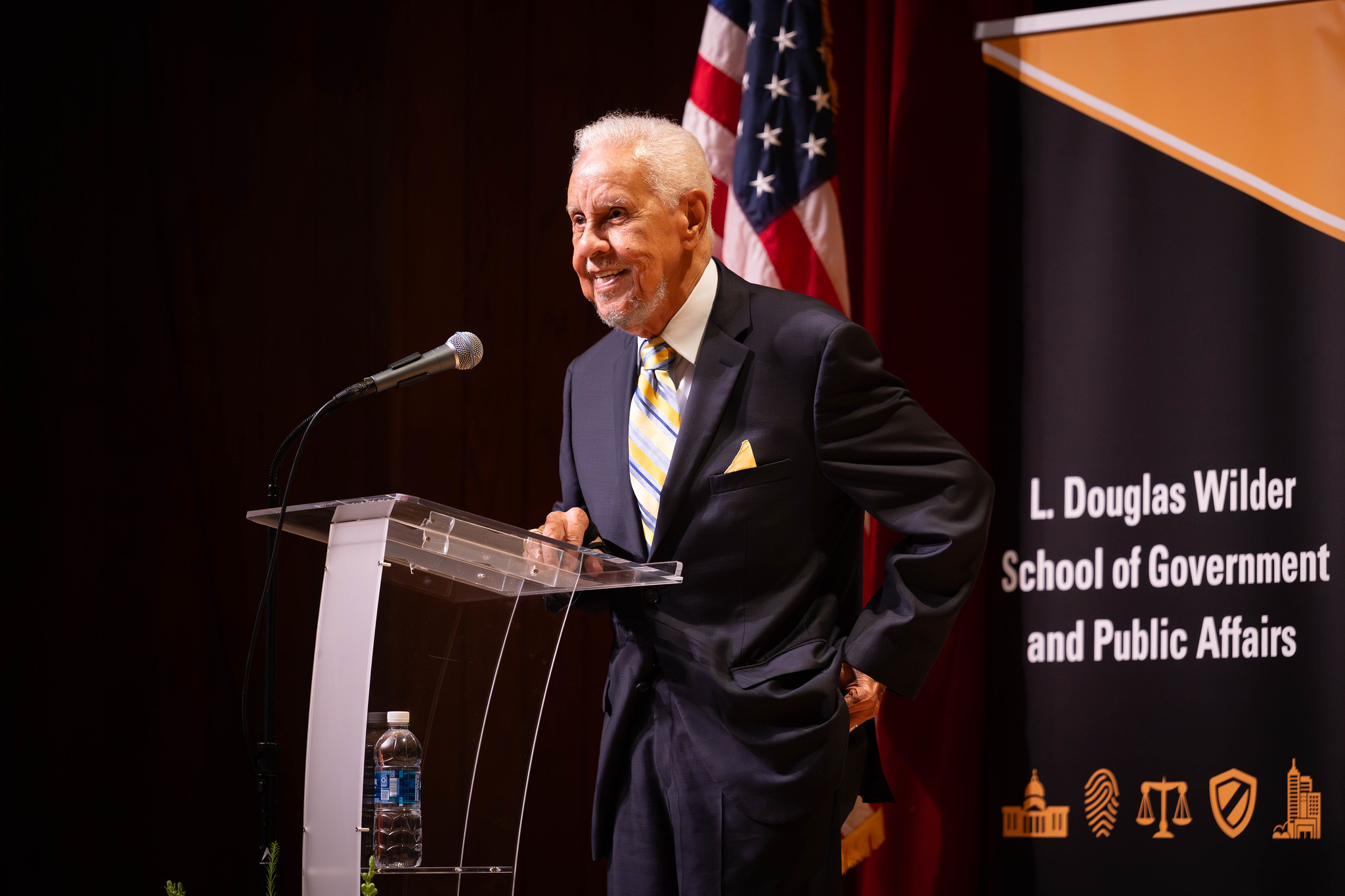 Governor L. Douglas Wilder at podium.