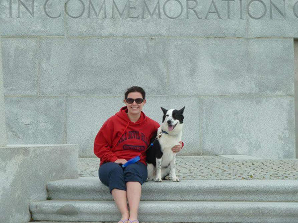 Blythe Bowman relaxes with one of her three dogs, Andrew, a familiar face on campus.