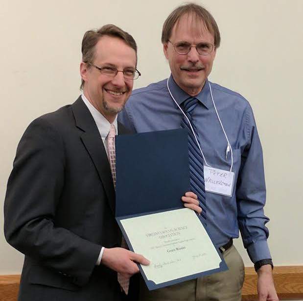 Grant Rissler receives his award from Peter Wallenstein, professor of history at Virginia Tech.