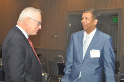  Dr. Robert Holsworth talks to Dr. Marcus Newsome, superintendent of Petersburg City Public Schools, during the CEPI 2018 Legislative Conference.