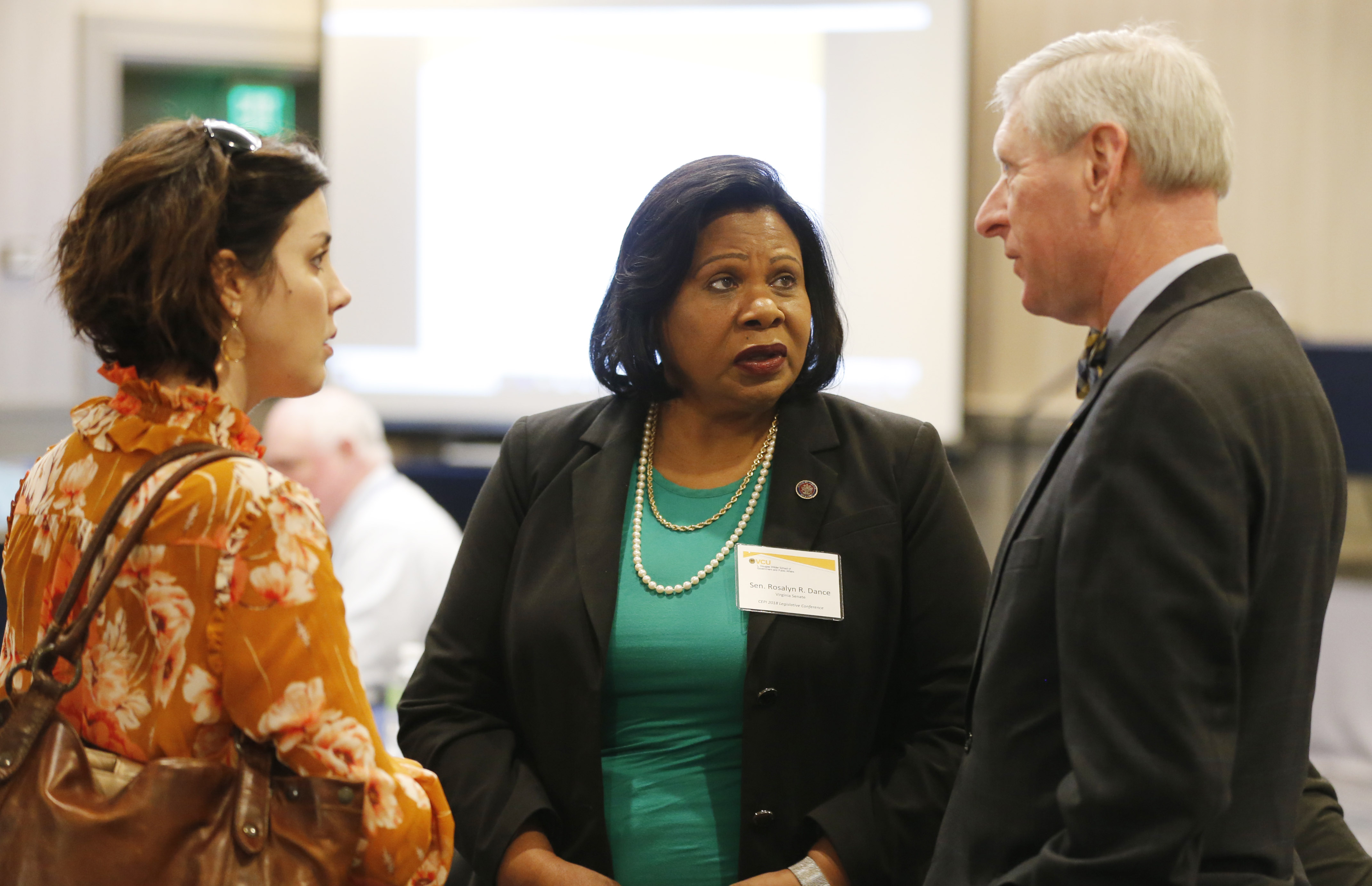 Dr. Hayley Cleary, Wilder School assistant professor, talks with state Sen. Rosalyn Dance of Petersburg and Del. Steve Landes of Augusta County at the Forum on School Safety in the Commonwealth.