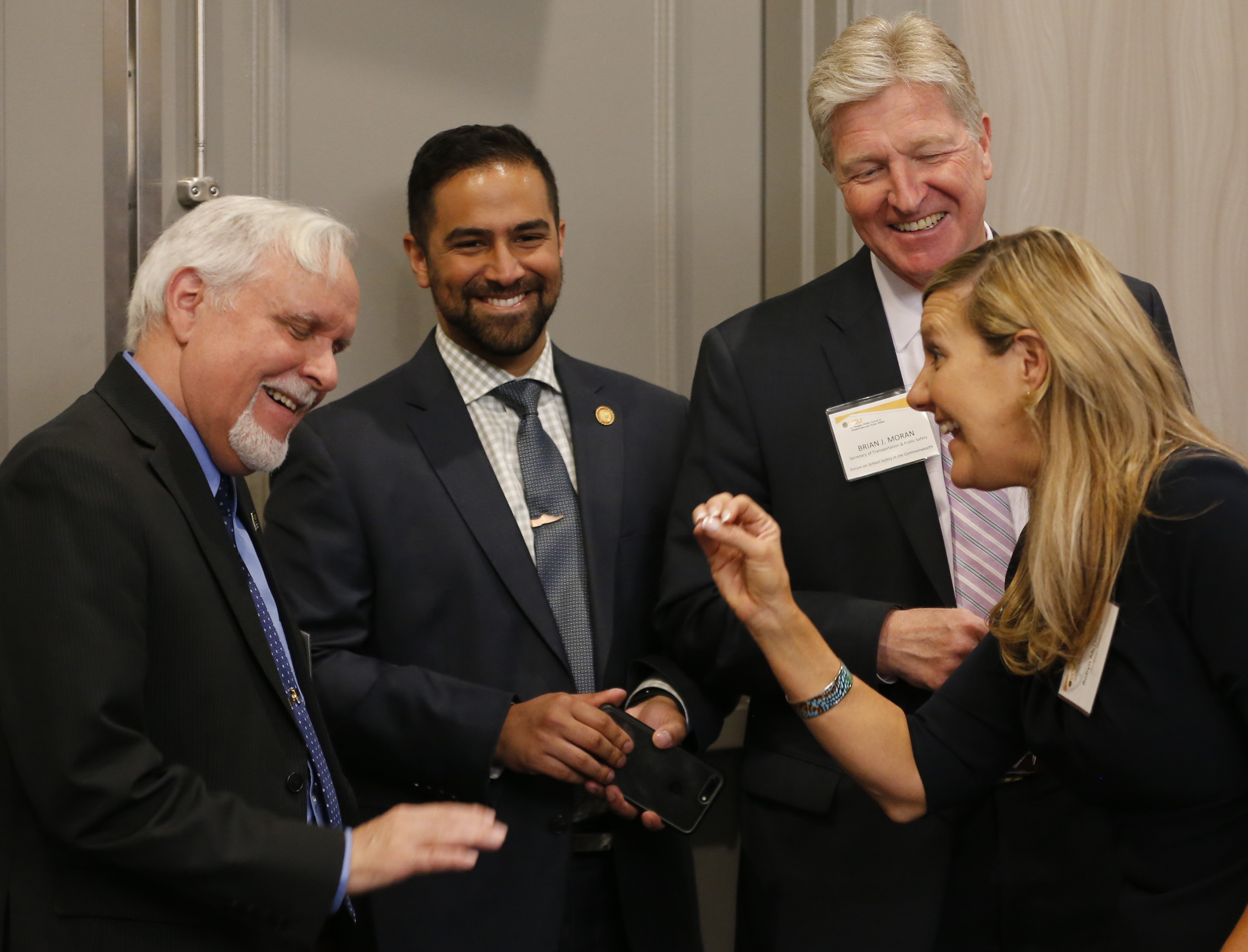  Dr. Robyn McDougle (right) with Secretary Brian Moran, Asif Bhavnagri of the Secretary’s Office, and James Keck, Wilder School assistant professor, at the Forum on School Safety in the Commonwealth.