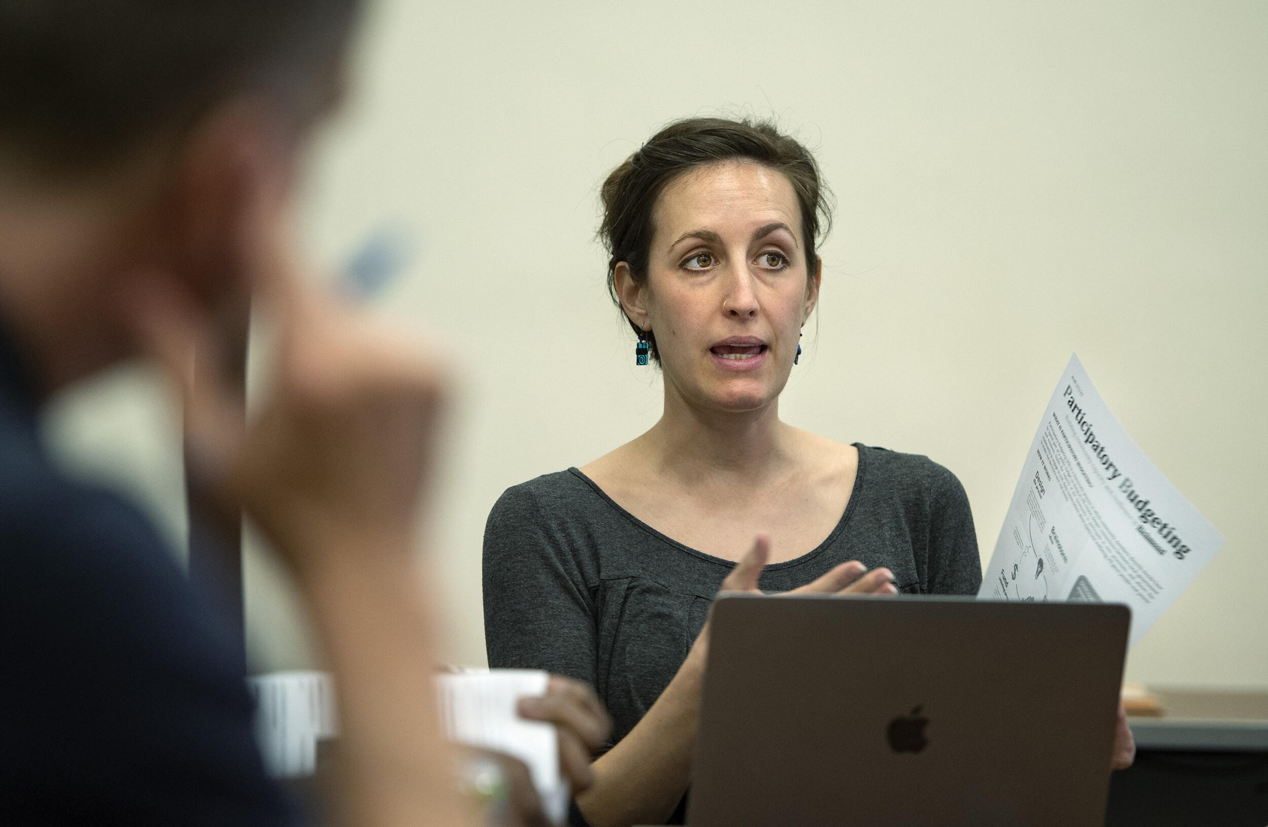 Adelaide Alexander, a master’s student in urban and regional studies and planning at VCU, speaks at a Richmond Participatory Budgeting Commission meeting this winter at the Richmond Public Library. (Kevin Morley, Enterprise Marketing and Communications)