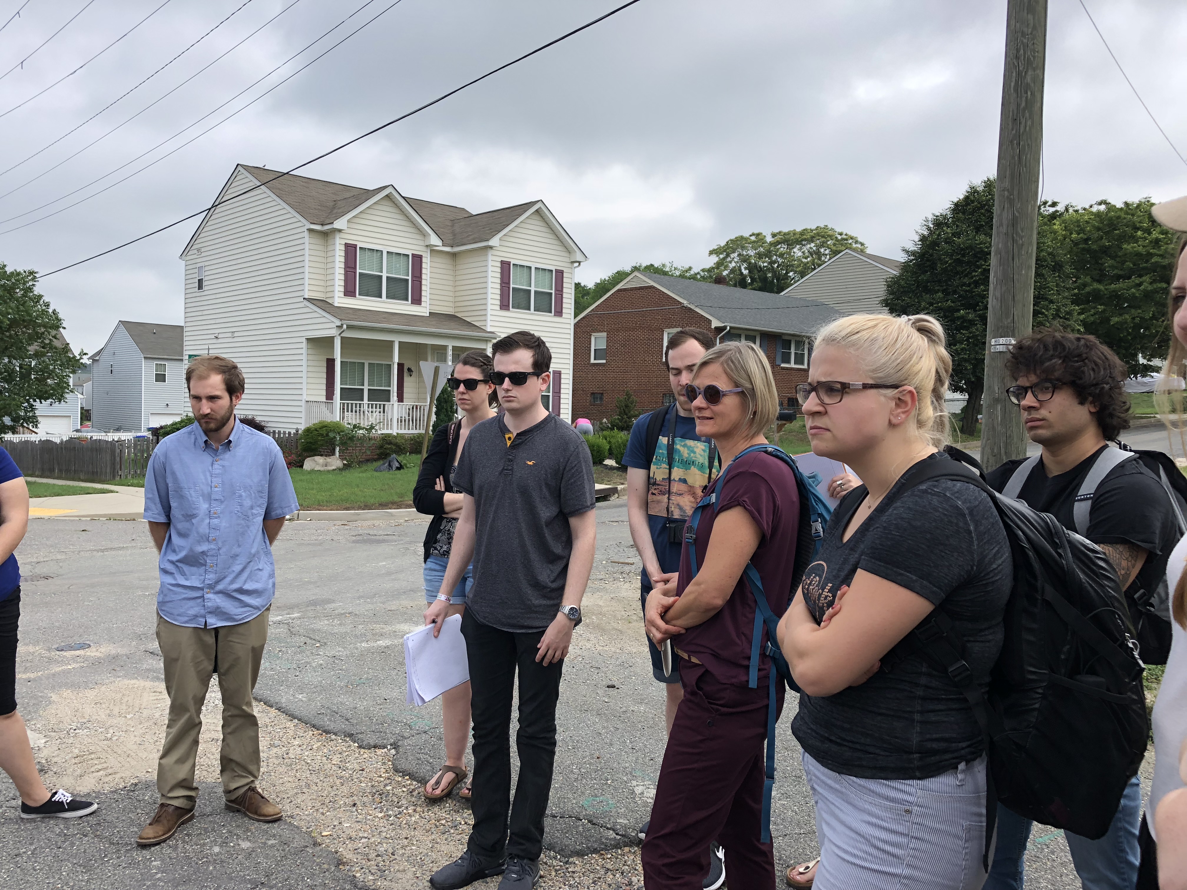 (Top) German exchange students, accompanied by their Wilder School hosts, tour Richmond's Fulton neighborhood. (Middle) German students presented to the Richmond Regional Planning District Commission on their system of planning and land use. (Below) Eights students are visiting from the University of Kaiserslautern, accompanied by two professors.