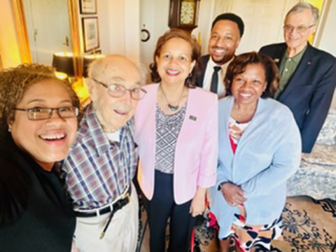 Wilder School and NASPAA colleagues gather with Dr. Laurin Henry at his home in Charlottesville, Va. last month. From left to right: Associate Dean RaJade Berry-James, Professor Emeritus Laurin Henry, Dean Susan T. Gooden and NASPAA Executive Director Angel Wright-Lanier. Back row, left to right: Development Director Stevan Dozier, Professor Emeritus Blue Wooldridge.