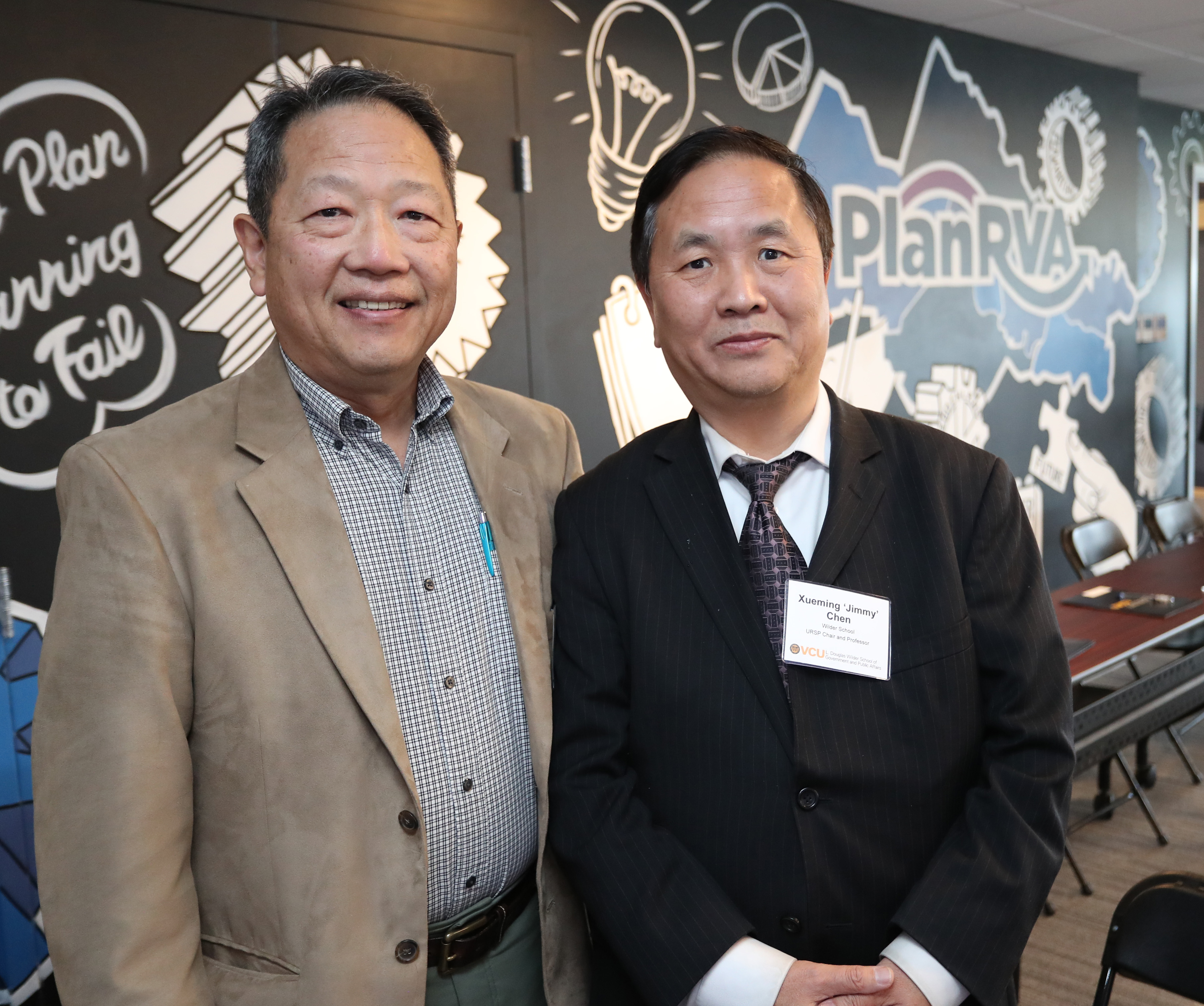 Ivan Suen and Jimmy Chen, both professors of urban and regional planning at the Wilder School, together at the 2023 Plan-Off held on May 6 at PlanRVA. Suen and Chen are the authors of a new study that reveals compelling evidence of the unequal distribution of pharmacies in Virginia, which disproportionately impacts vulnerable populations.