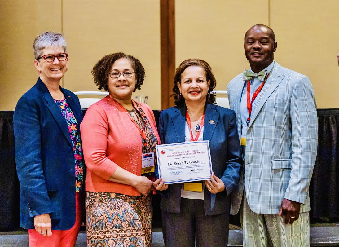 Dean Susan T. Gooden accepts the 2023 Philip J. Rutledge Social Equity Award presented by the National Academy of Public Administration. Pictured from left to right: Teresa Gerton, Ph.D.; President and CEO of NAPA, RaJade M. Berry-James; Senior Associate Dean, VCU Wilder School and NAPA Co-Chair of the Standing Panel on Social Equity; Susan T. Gooden; Dean, VCU Wilder School; and Charles Menifield