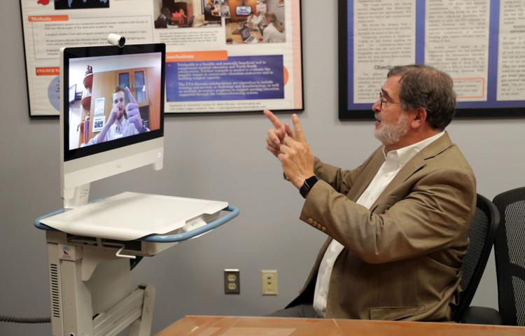 David Cattell-Gordon, director of Telehealth Operations at UVA Health, conducted a simulated test in July 2019. While telehealth services are expanding during the coronavirus pandemic, reliable internet access is necessary to receive care in remote settings.  THE DAILY PROGRESS