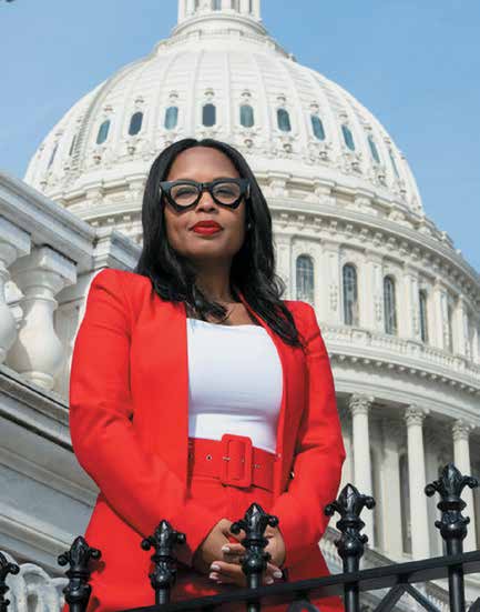 A photo of sesha joi moon in front of the capitol building